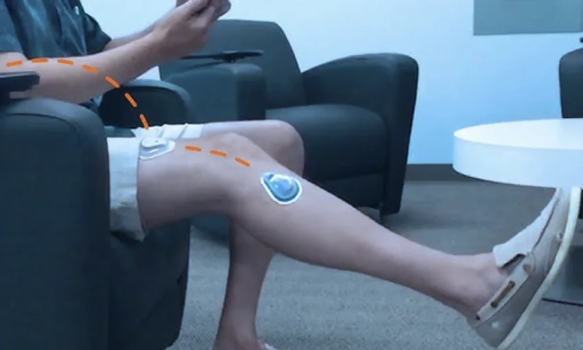 TracPatch sensors worn above and below the knee during guided movement